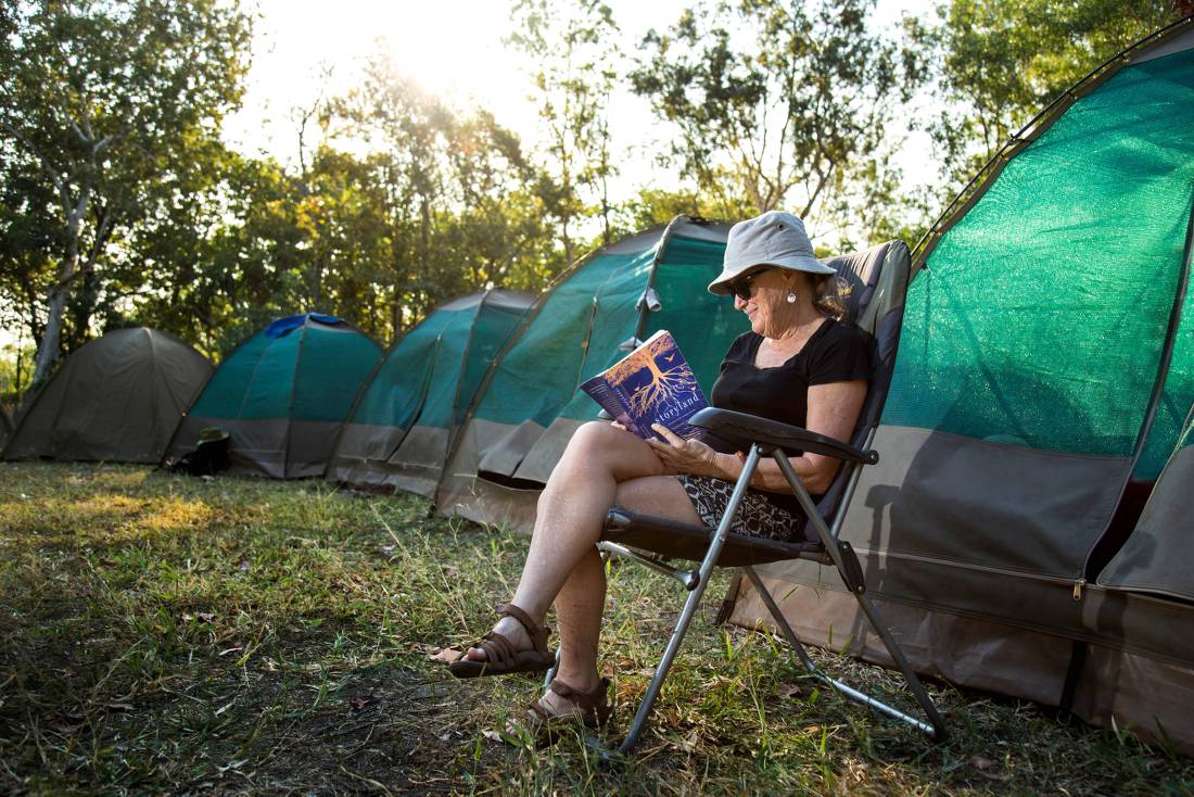 Relaxing with a book by our wilderness campsites | <i>Nicholas Gouldhurst</i>